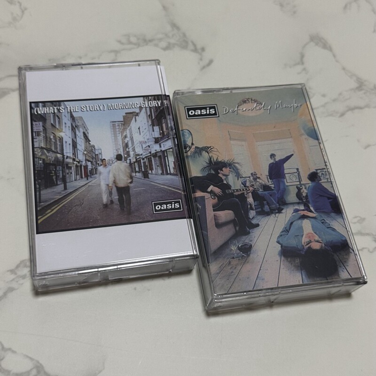 Vintage Collectibles - Кассеты британской рок-группы Oasis с буклетами